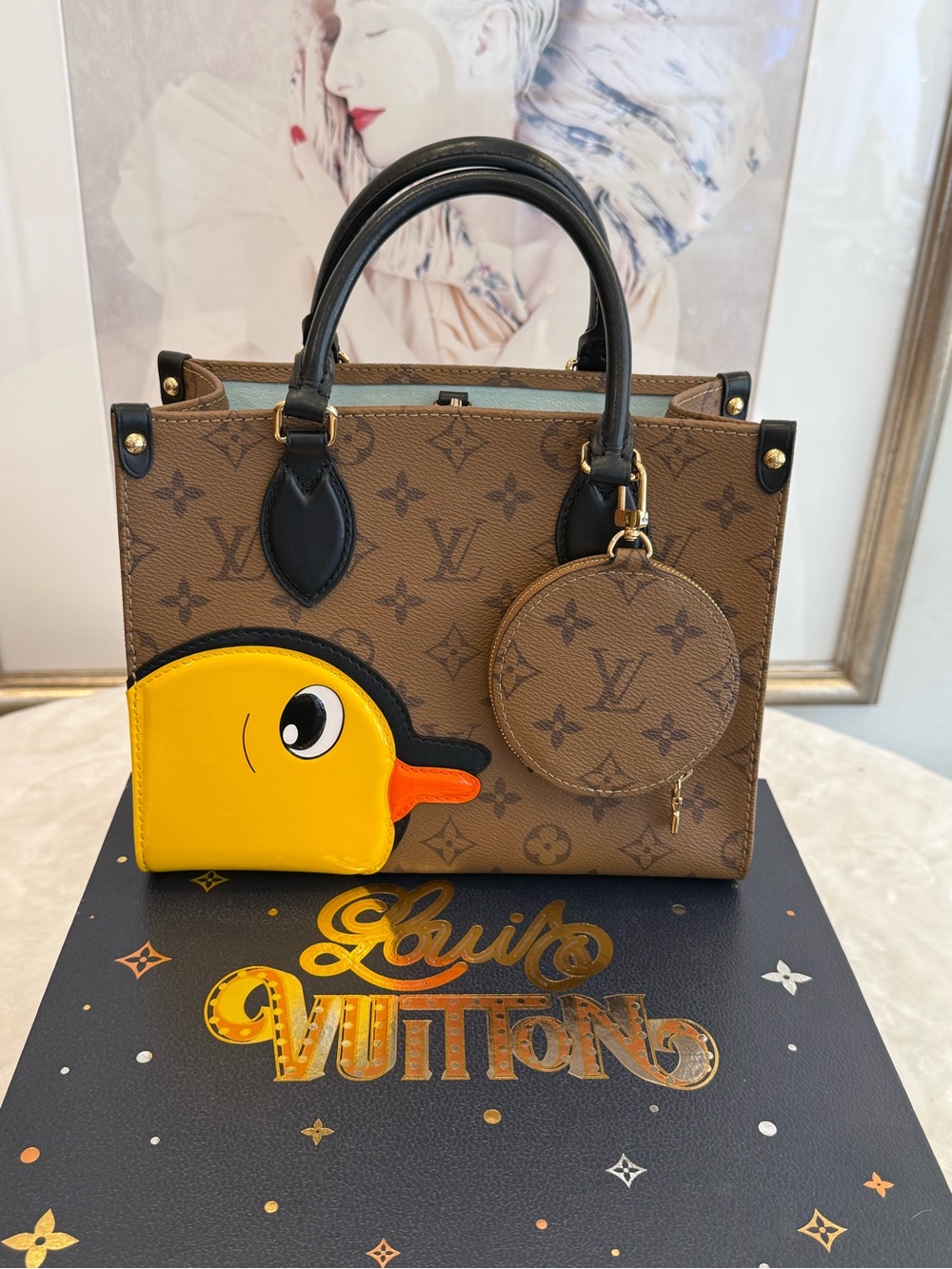 Louis Vuitton Brown Monogram Satchel with Yellow Duck Charm